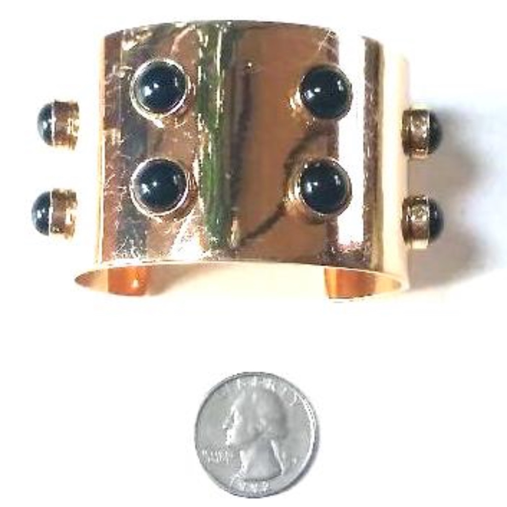Gold tone cuff bracelet w/black studs 1 3/4" thick